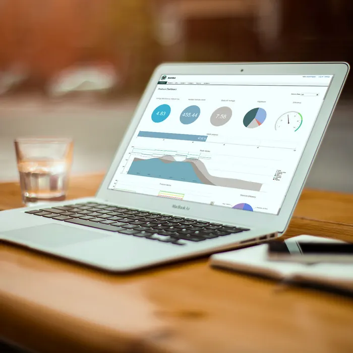 Barklee dashboard with charts on a laptop