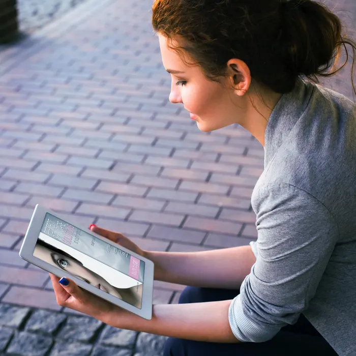 A person using the in-store kiosk app on a tablet